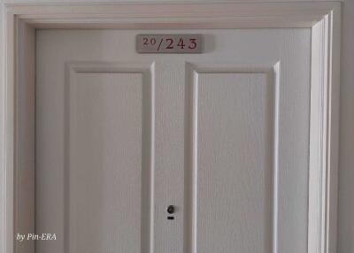 Apartment door with unit number 243