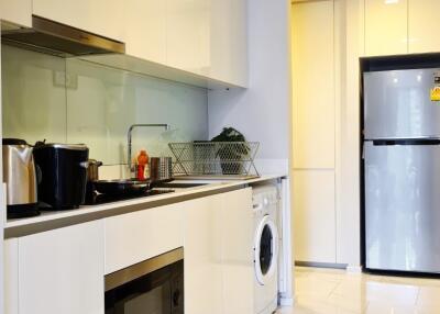 Modern white kitchen with appliances