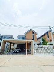 Modern house exterior with garage and driveway