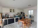 Spacious kitchen with a modern design and dining area