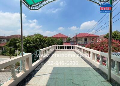 Spacious balcony with views of the neighborhood