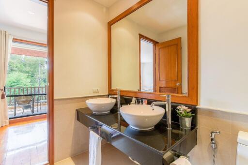 Modern bathroom with double sinks and large mirror