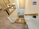 Modern staircase with wooden steps and railings