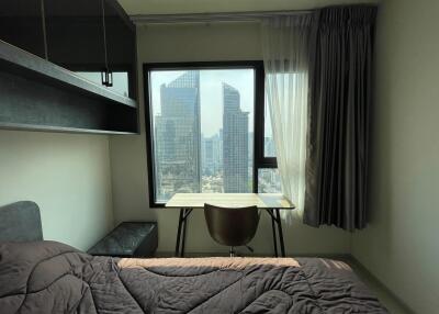 Bedroom with a city view
