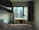 Bedroom with a city view