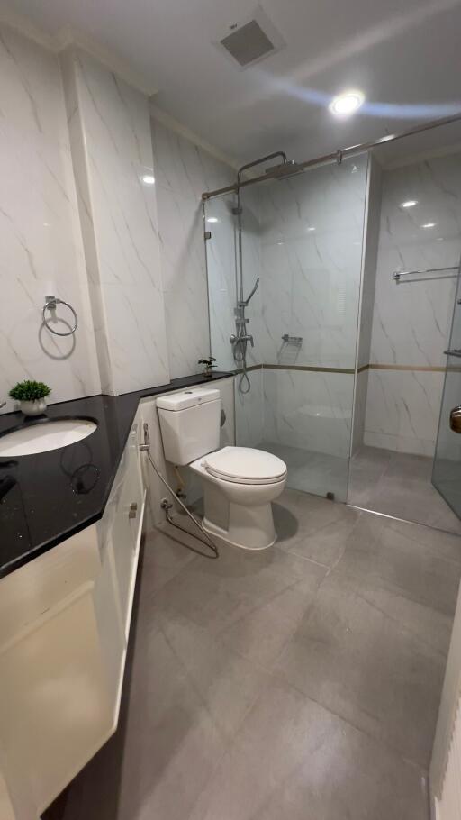 Modern bathroom with glass shower enclosure