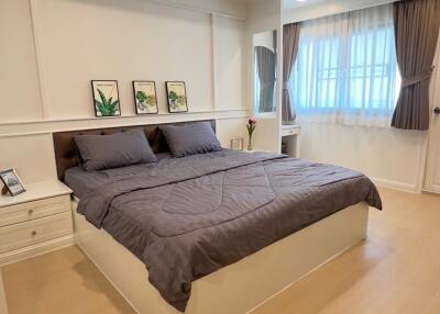 Modern bedroom with double bed and decor