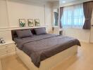 Modern bedroom with double bed and decor