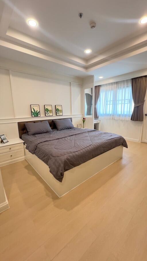 Modern bedroom with double bed and decor