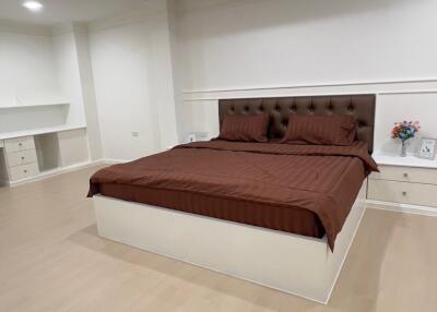 Spacious bedroom with double bed and modern decor