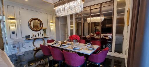 Luxury dining room with elegant decor and chandelier