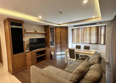 Spacious and well-lit living room with modern amenities