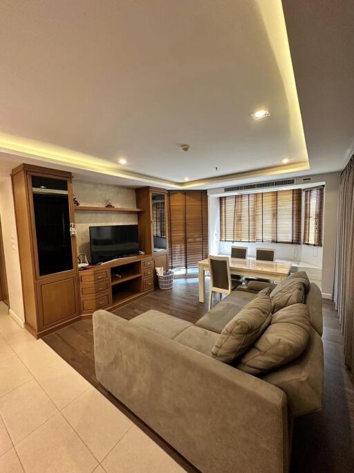 Spacious and well-lit living room with modern amenities