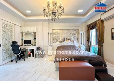 Spacious bedroom with elegant decor and modern amenities