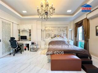 Spacious bedroom with elegant decor and modern amenities
