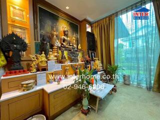 Living room with religious artifacts and decor