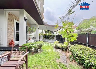 Exterior view of a house with garden