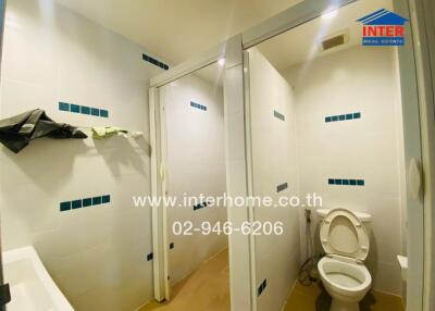 Bathroom with toilet and shower area