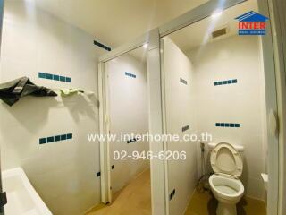 Bathroom with toilet and shower area