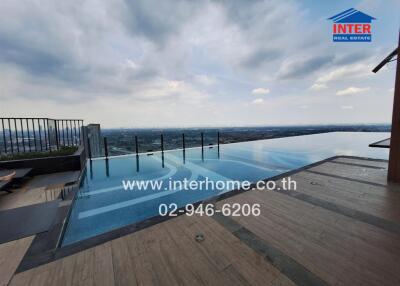 Infinity pool with expansive city view