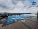 Infinity pool with expansive city view