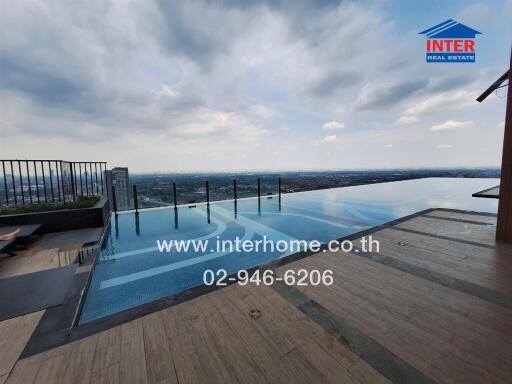 Infinity pool with expansive city view