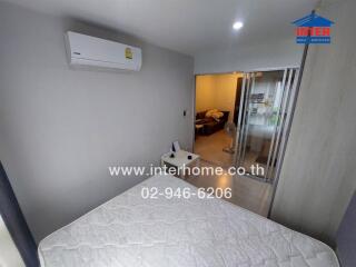 Bedroom with mattress and air conditioning