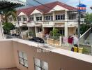 Neighborhood view of residential houses from a balcony