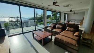 Spacious living room with large windows and beautiful view