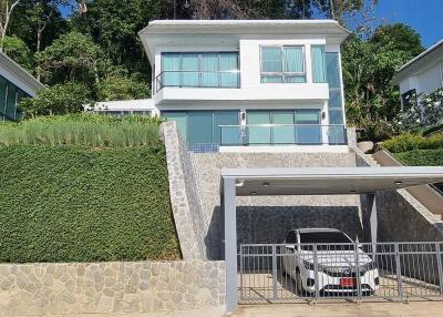 Modern hillside house with garage