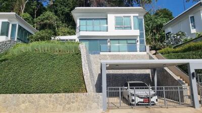 Modern hillside house with garage