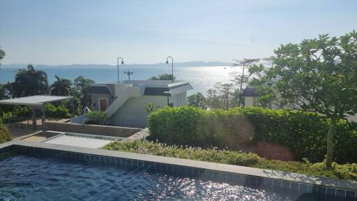 Scenic outdoor view with pool and landscape