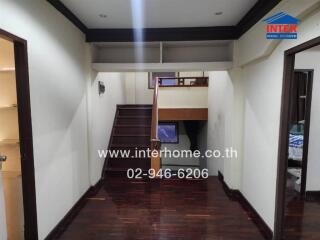 Interior area with wooden floors and staircase