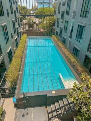 Outdoor swimming pool in an apartment complex
