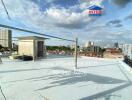 Rooftop view with cityscape background