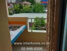 Balcony with a sink and view of surrounding buildings