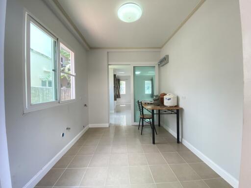 Bright dining area with table and chairs