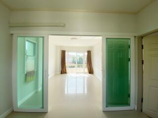 Spacious and bright main living area with sliding glass doors