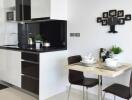 Compact modern kitchen with dining area
