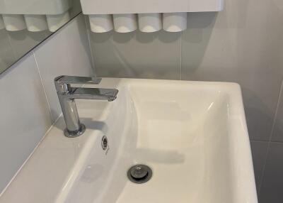 Bathroom sink with soap dispenser