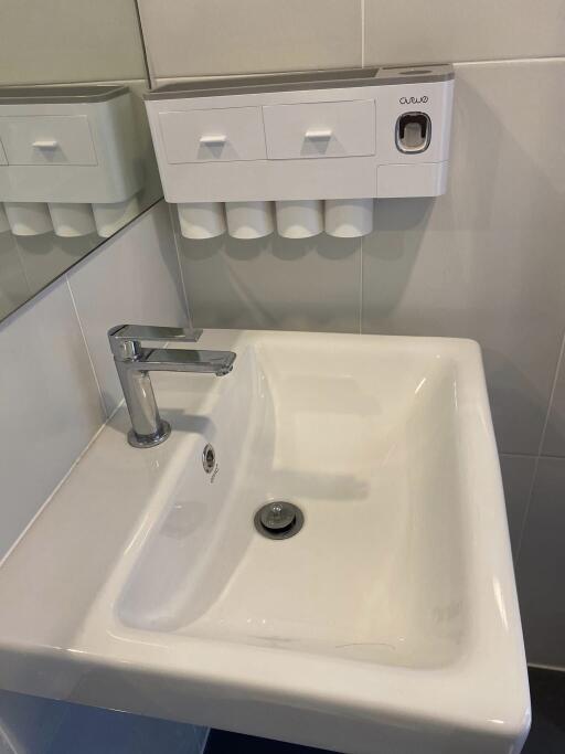 Bathroom sink with soap dispenser