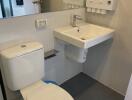 Modern bathroom with sink and toilet