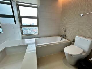 Modern bathroom with bathtub and toilet