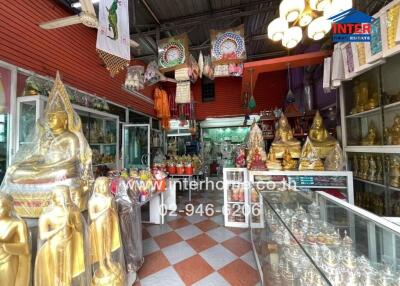 Shop with various Buddha statues and religious artifacts