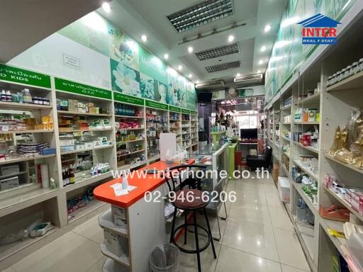 Photo of a well-organized store interior with shelves filled with various products and a service counter