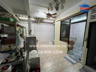 Kitchen area with visible appliances and storage