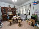 Living room with wooden furniture and decorative items