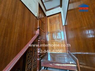 Wooden staircase and landing area