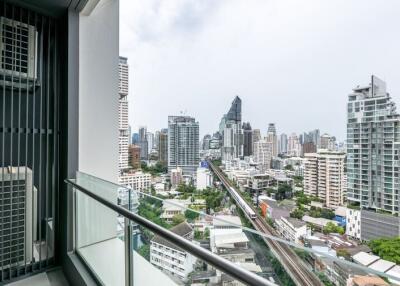 City view from apartment balcony