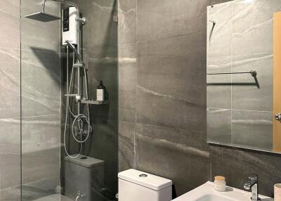 Modern bathroom with a glass-enclosed shower